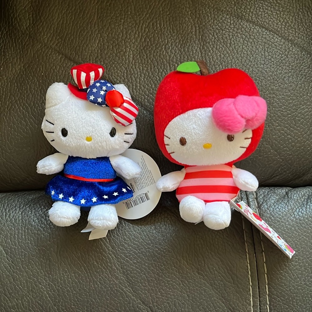 Two cute hello kitty stuffed animals